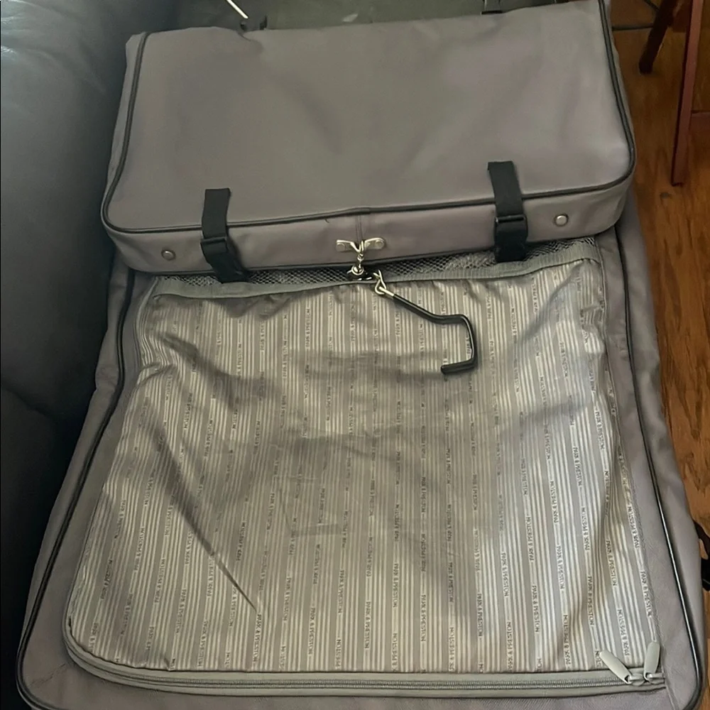 Black and Gray Travel Bags with Metal Accents